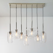 Lumivelle Sculptural 7-Light Chandelier – Adjustable Height Modern Glass Pendant